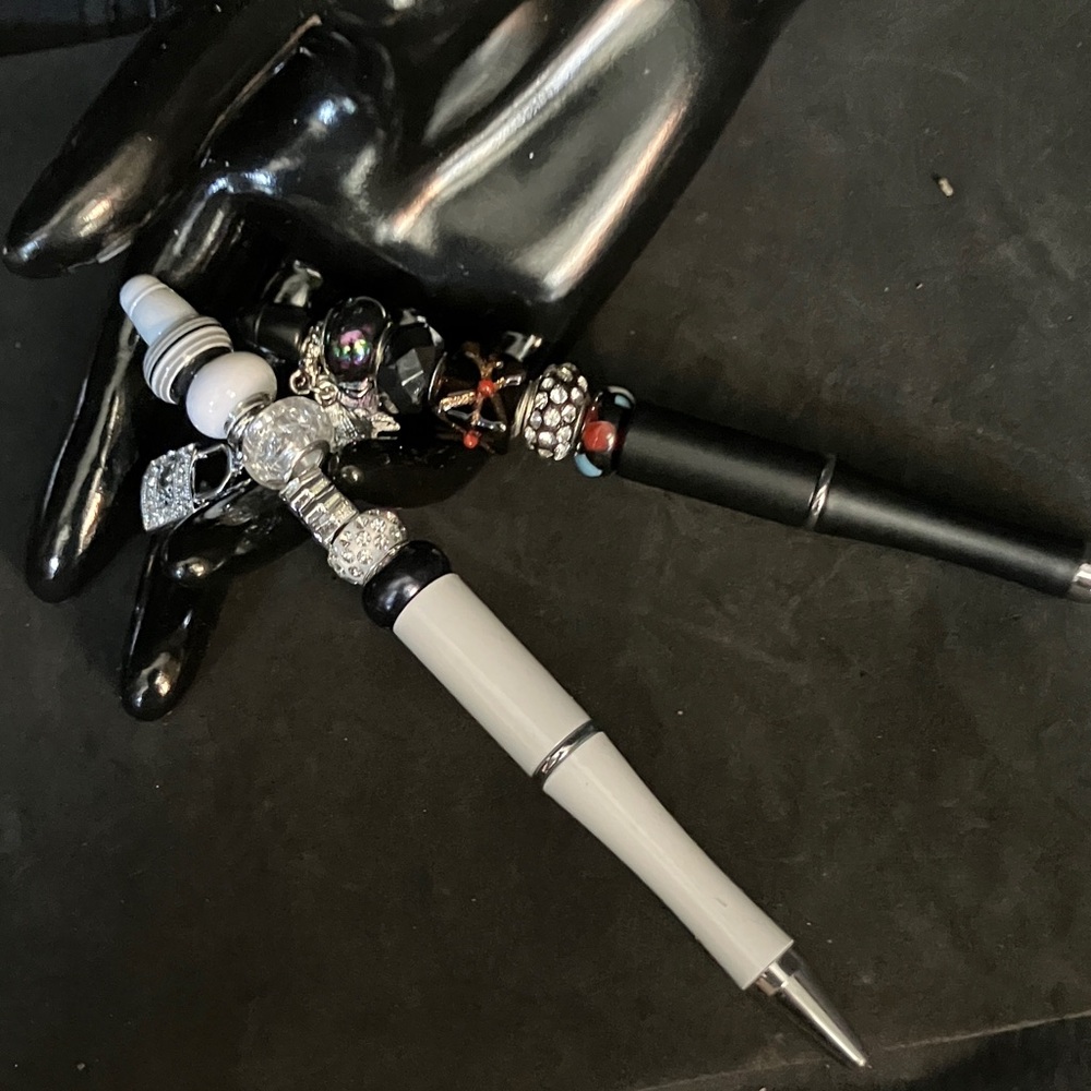 Black and White Ballpoint Pens with Silver Accents